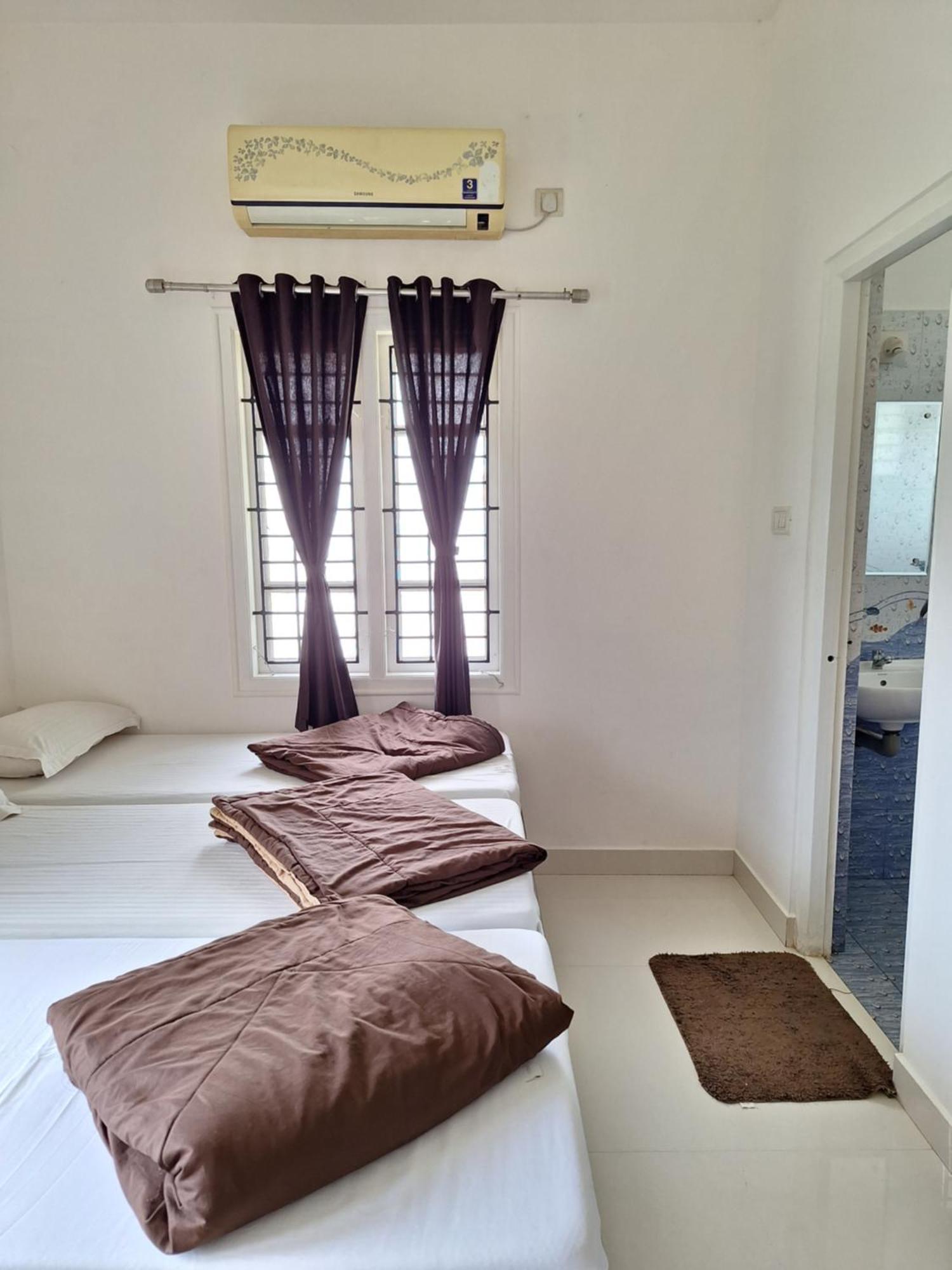 Suvarna Grande Homes Mangaluru Zimmer foto