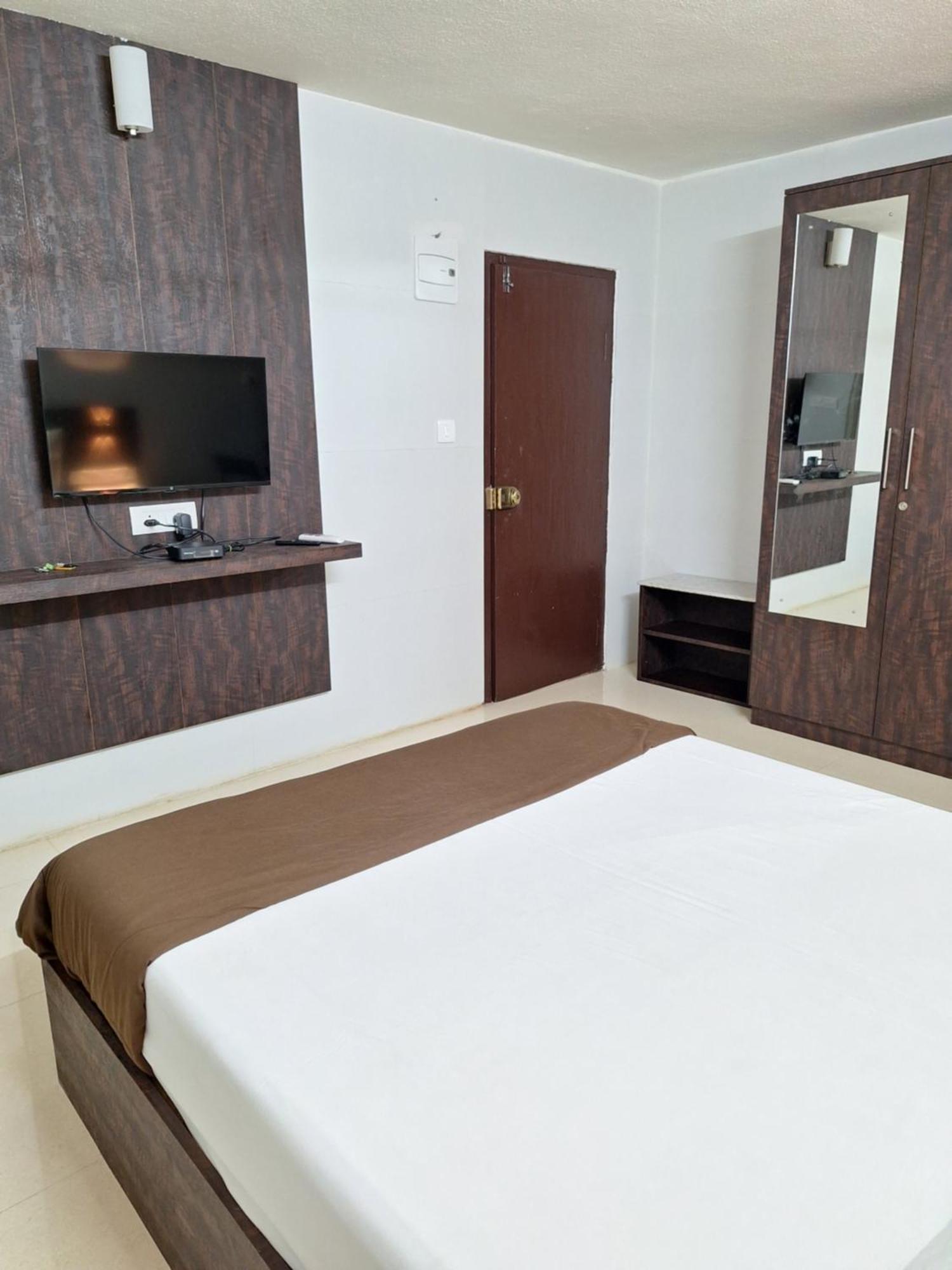 Suvarna Grande Homes Mangaluru Zimmer foto